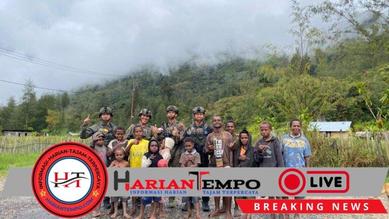 Personel Ops Damai Cartenz Tebar Keceriaan Bersama Anak-Anak di Distrik Bibida, Paniai